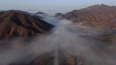 a foggy autumn highway scene