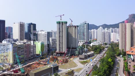 mega building construction site in downtown hong kong, aerial view