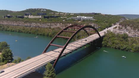 high angle establishing shot of the pennybacker bridge in austin, texas