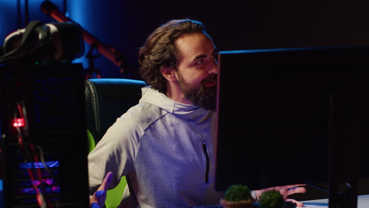 Streamer arriving in studio, ready to start streaming for online viewers, talking with them