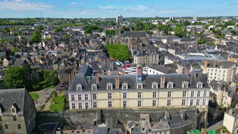 cityscape of laval with le château-neuf and cathedral sainte trinité in background, france