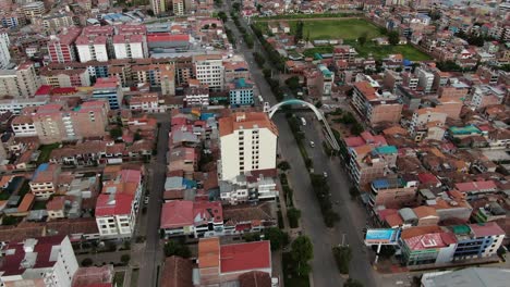 4k-daytime-panoramic-aerial-drone-footage-over-Avenida-de-la-Cultura-boulevard-in-Cusco,-Peru-during-Coronavirus-lockdown