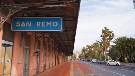 streetscape of sanremo, italy. public transport station on the road