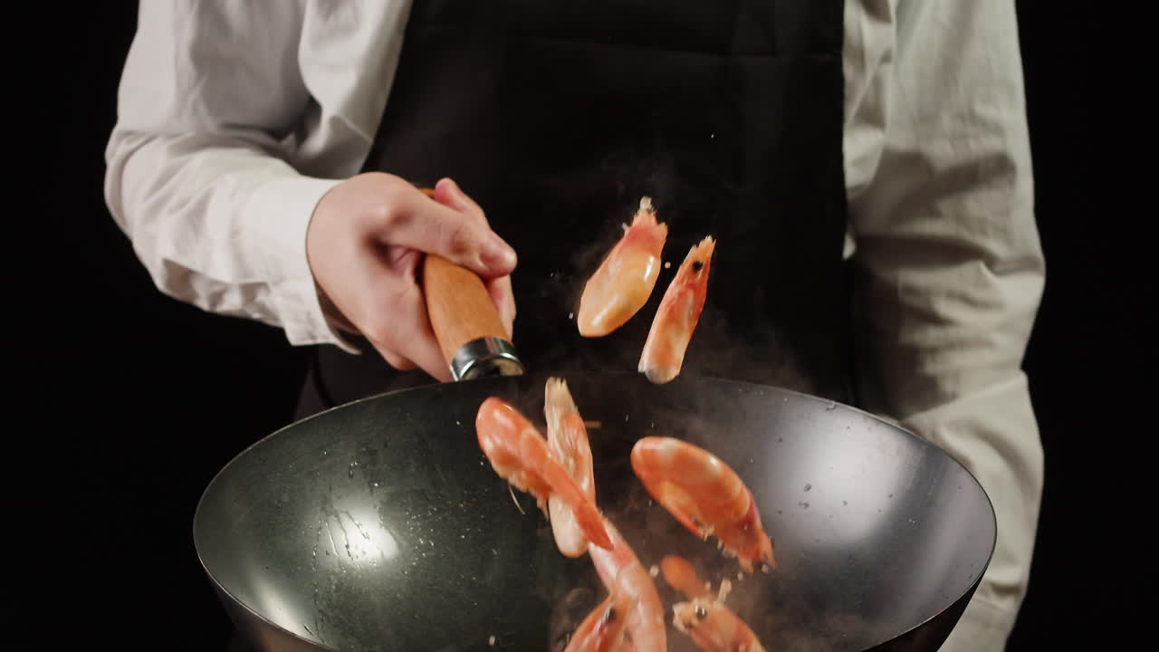 Chef Cooking Shrimp in Wok