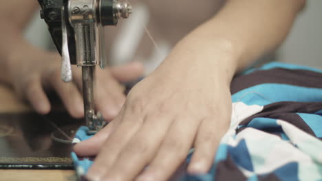 seamstress working on a sewing machine