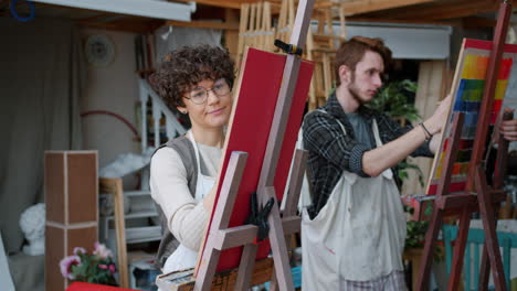 artists painting in an art studio