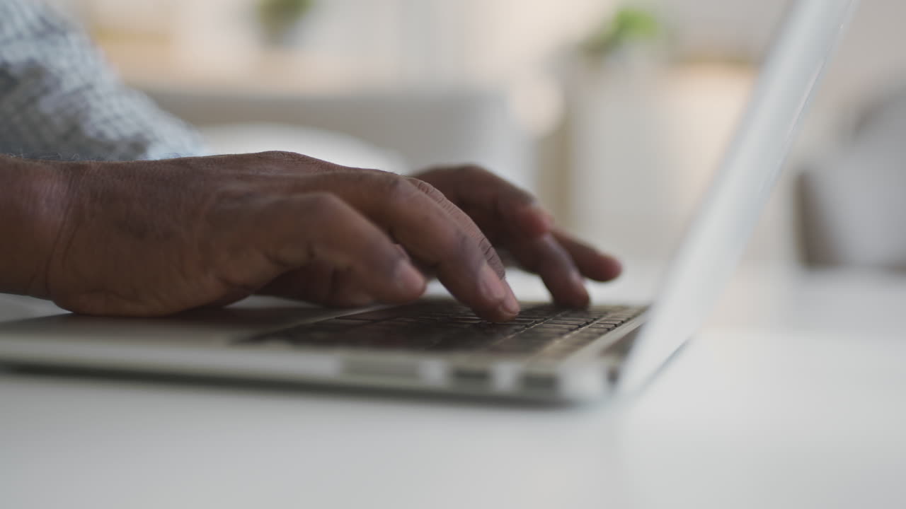 Person typing on a laptop