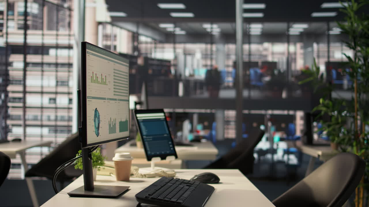 Modern Office Workspace with Data Displays