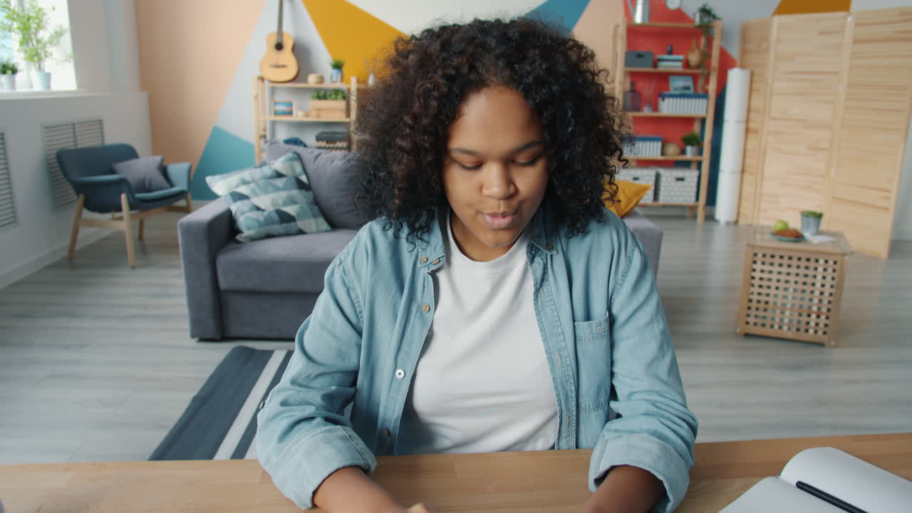 Young Woman Studying at Home