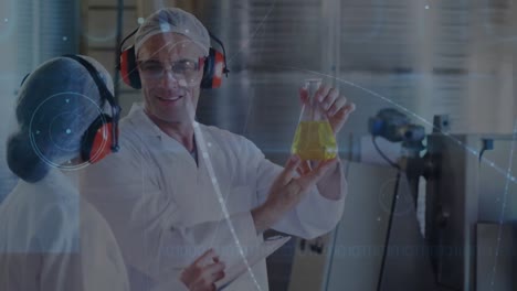 Animation-of-connected-dots-over-caucasian-scientists-examining-liquid-in-beaker-at-laboratory