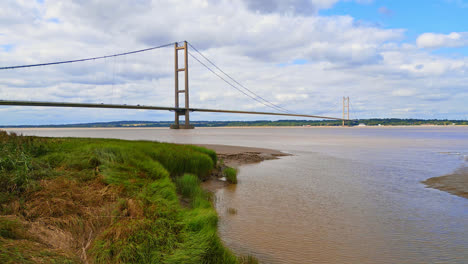 aerial scene: humber bridge, river, traffic, lincolnshire to humberside