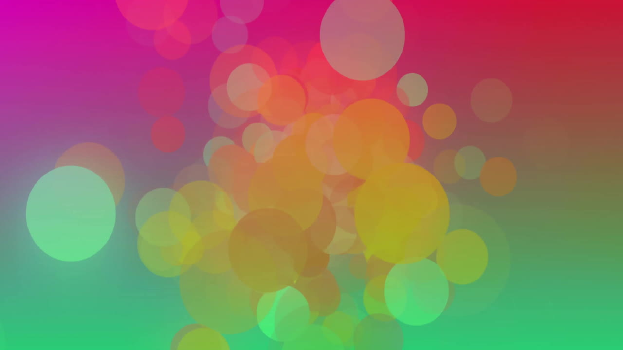 Animation of colourful spots on pink and green background