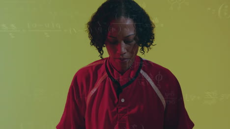 woman standing against backdrop interacting with floating math and molecule graphics for science