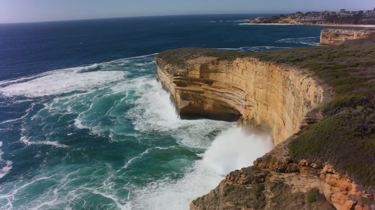Powerful Waves Crashing Against Coastal Cliffs
