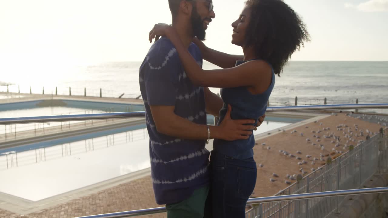 Couple embracing each other at beach 4k