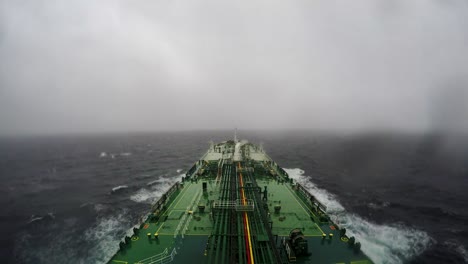 time lapse oil tanker heavy rolling crossing strait magellan punta arenas rain