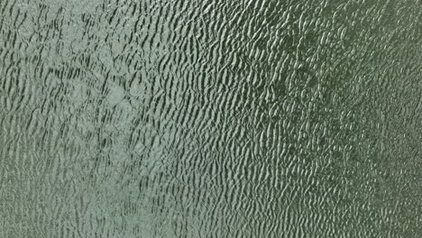 rippled surface of water in windy conditions