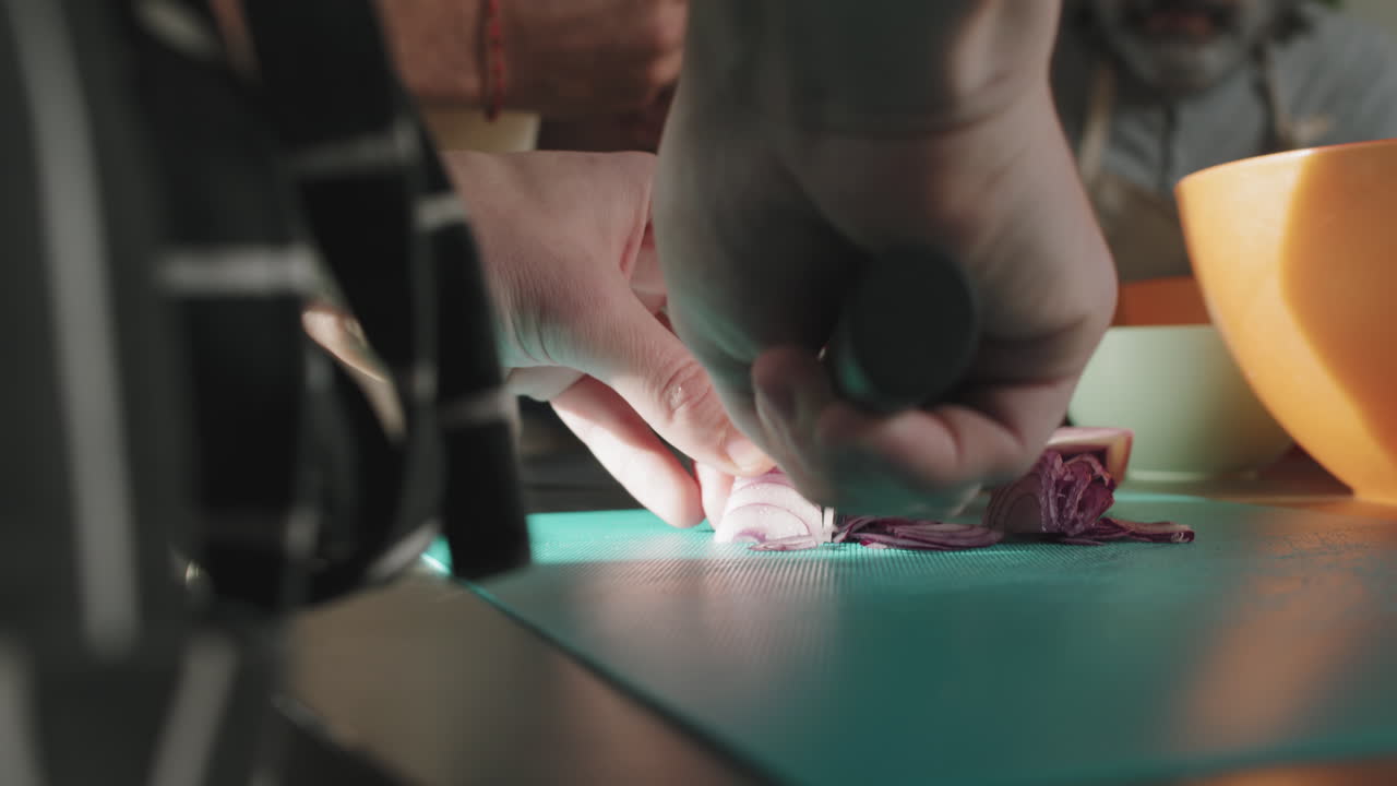 Chef Cutting Red Onion