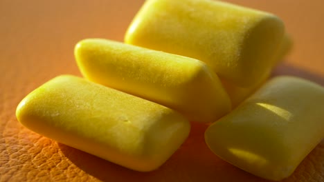 close-up of yellow chewing gum pieces