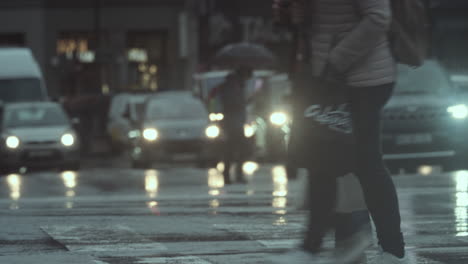 people walk in the rain