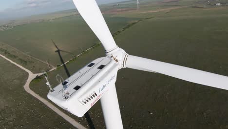 close-up view of a wind turbine in a wind farm