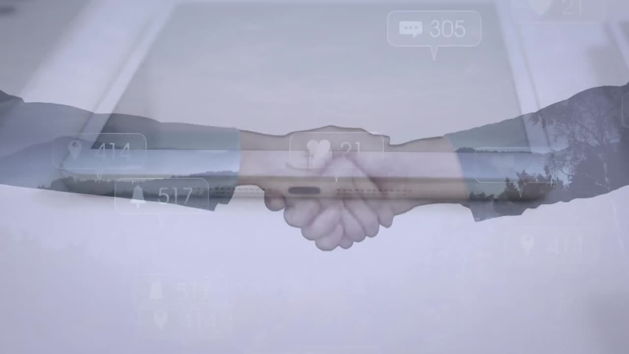 Animation of businessman handshake over social media icons and tablet