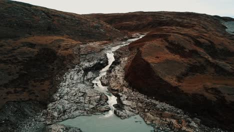 aerial pull-out on greenlandic waterfall by the icecap and point 660, outside kangerlussuaq