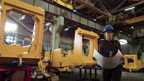 Worker-with-helmet-walking-indoors