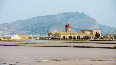 TIme-lapse-over-Trapani-salt-flats-of-salt-museum,-Sicily,-Italy