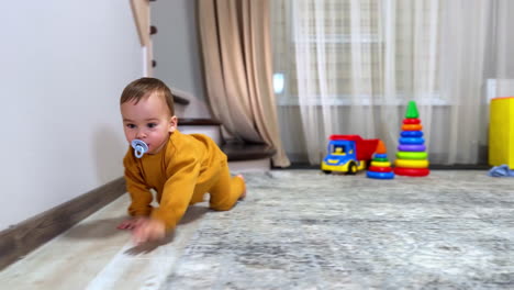 baby playing with toys in a cozy living room