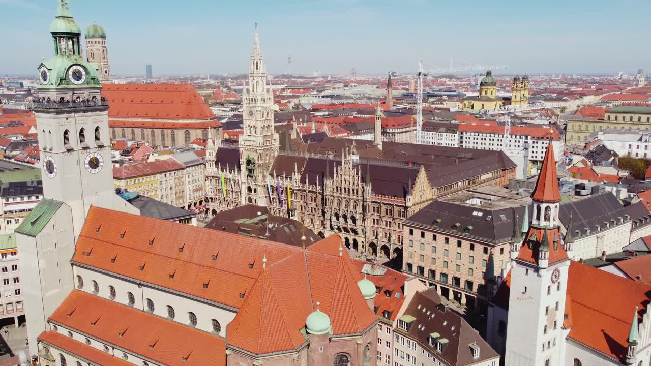 Rathaus-Glockenspiel Historical Landmark At Marienplatz Plaza In Munich, Germany. Aerial Drone Shot