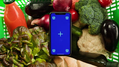 smartphone in grocery basket