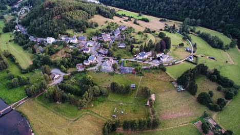 aerial shot of the village frahan in belgian ardennes with semois river