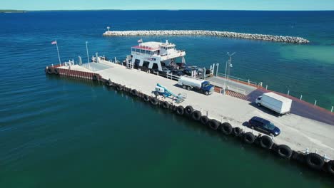 cars and trucks deboard the washington island car