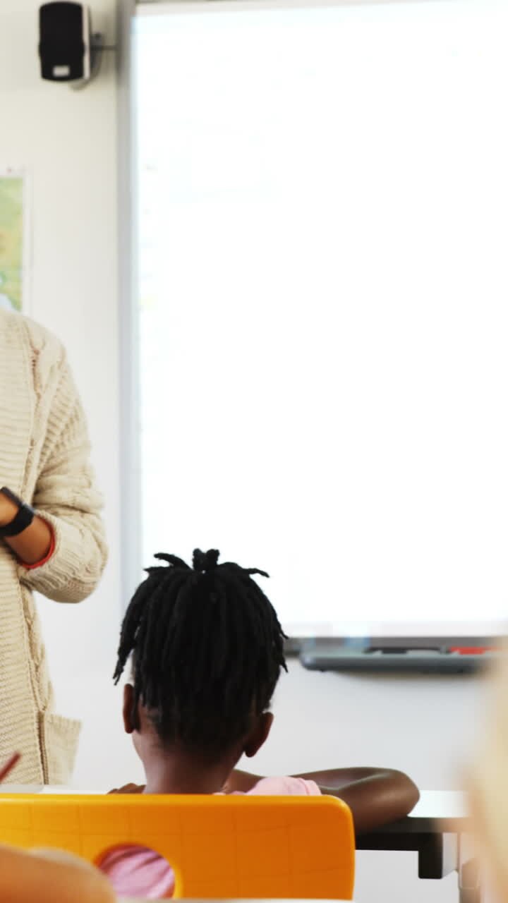 Teacher teaching in classroom