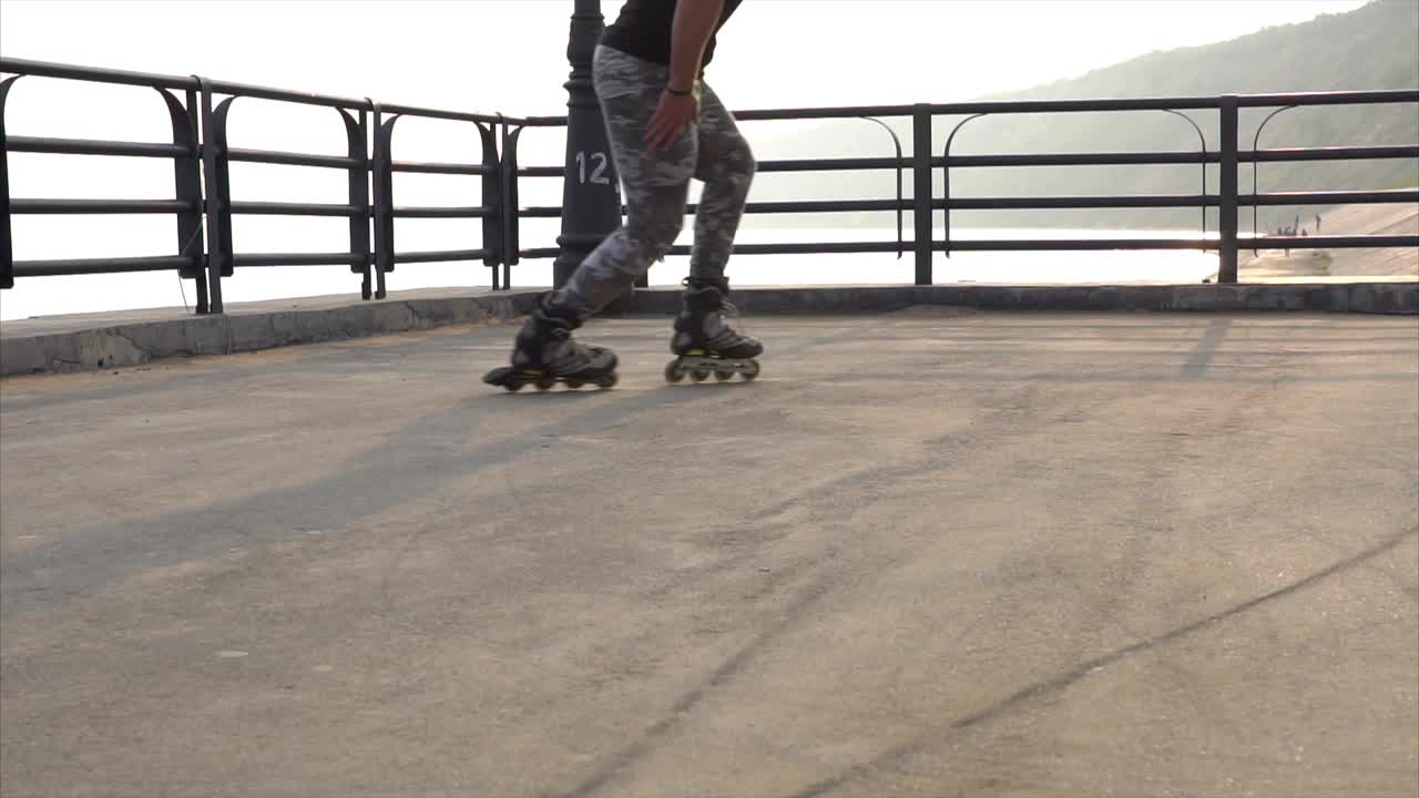 Person Rollerblading on a Seaside Pier