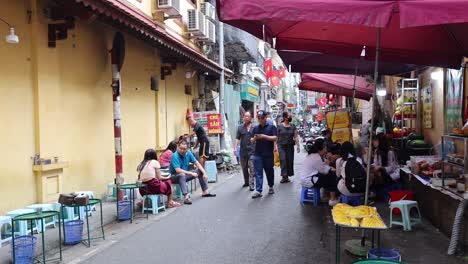 people interacting in a vibrant street market