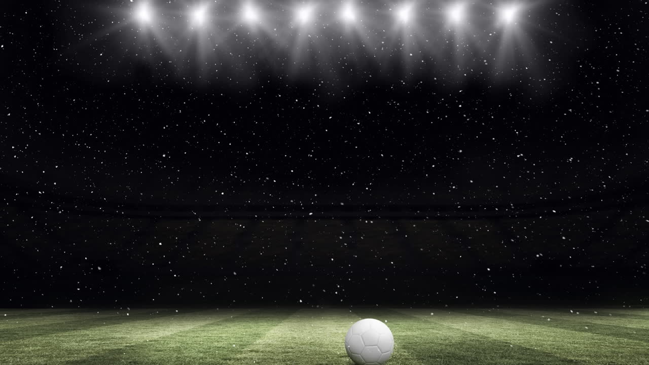 스포츠 스타디움에서 축구 위에 끊임없는 루프로 떨어지는 눈의 애니메이션