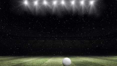 스포츠 스타디움에서 축구 위에 끊임없는 루프로 떨어지는 눈의 애니메이션