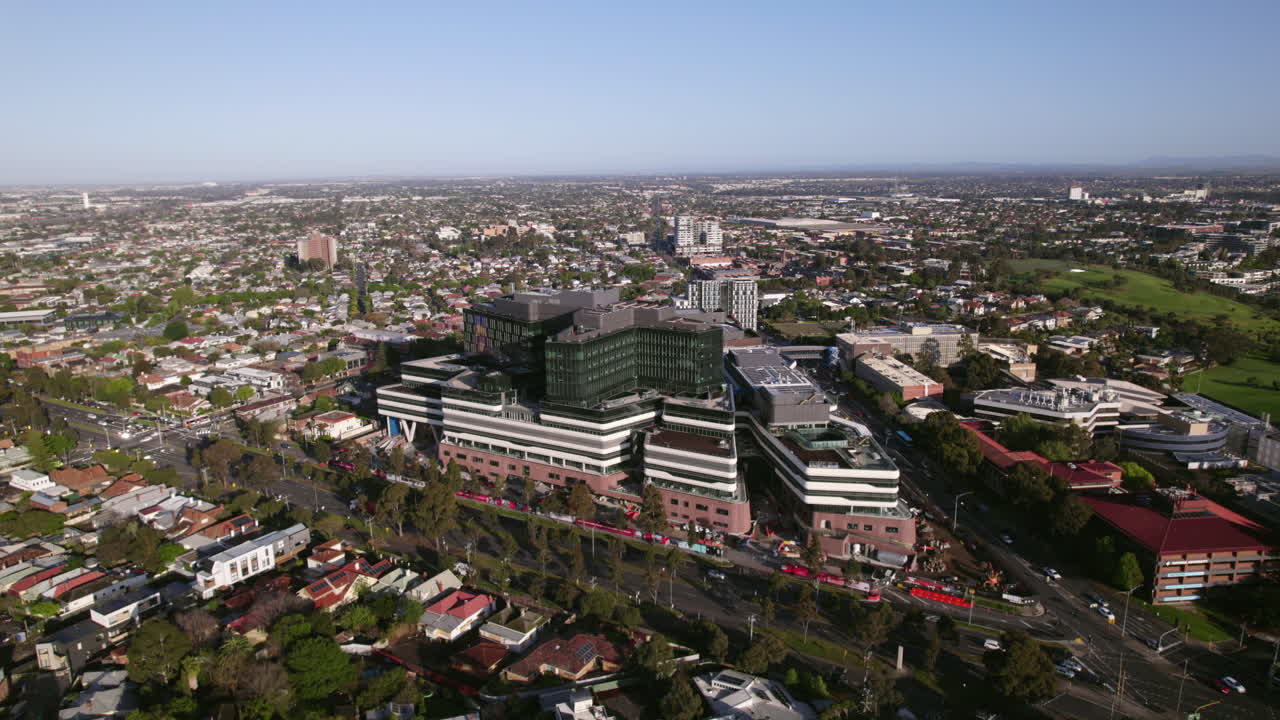 Aerial View of a Modern Hospital in a Suburban City
