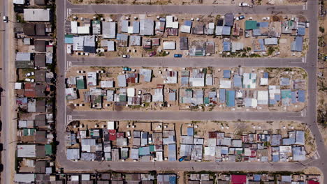 top down drone flight over township - informal or makeshift houses built on soil