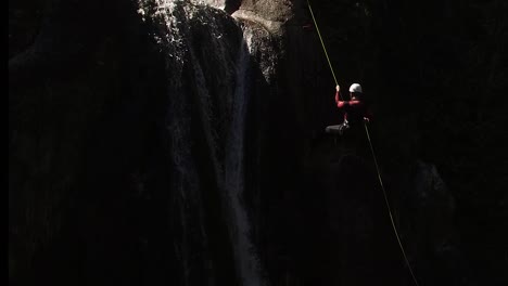 adventure down mountain with waterfall