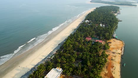 aerial drone shot showcasing an island and lush coconut trees in udupi