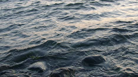 Waves-moving-in-slow-motion-at-daylight-towards-the-beach