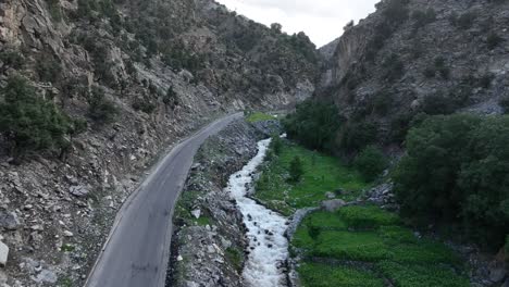 verdant chilas-babusar roadside, northern pakistan. aerial fly-over