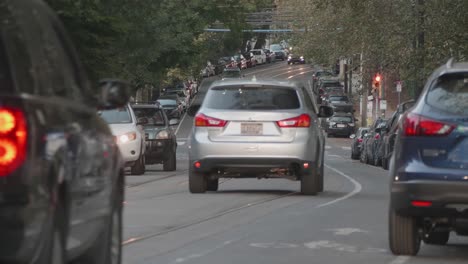 traffic, cars, headlights along baltimore avenue, west philadelphia, twilight