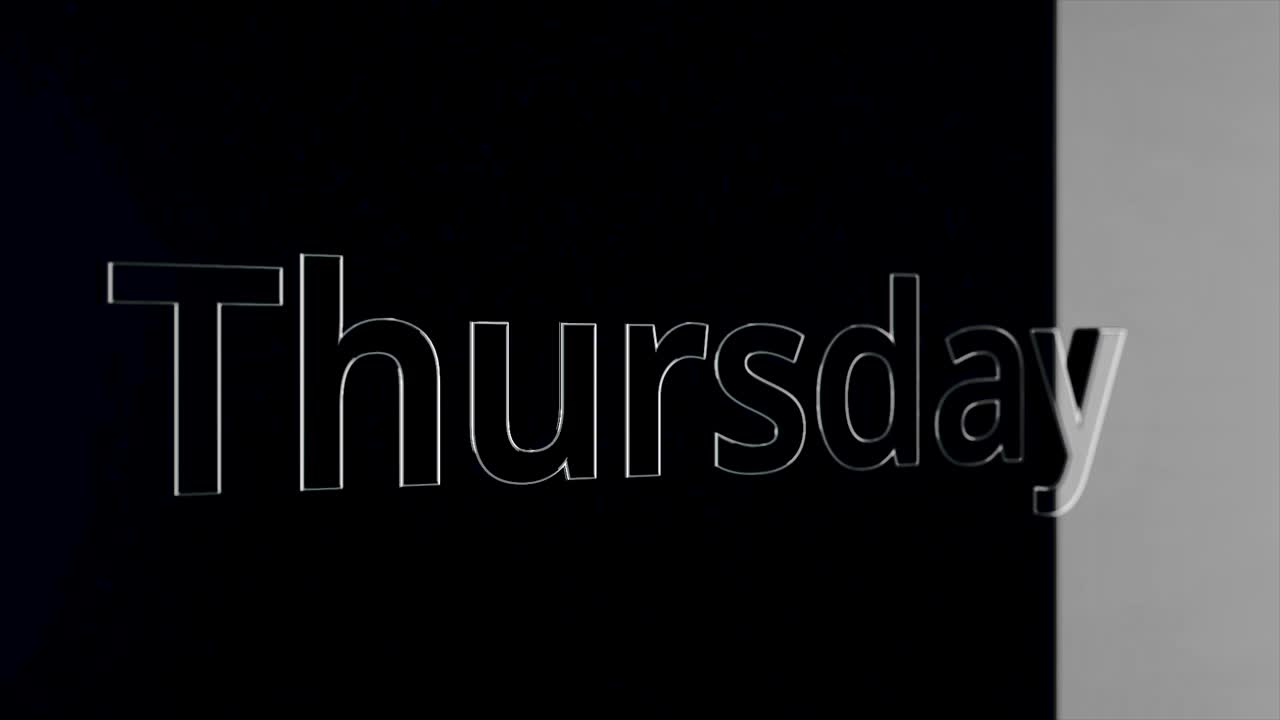 Thursday Displayed on a Dark Background