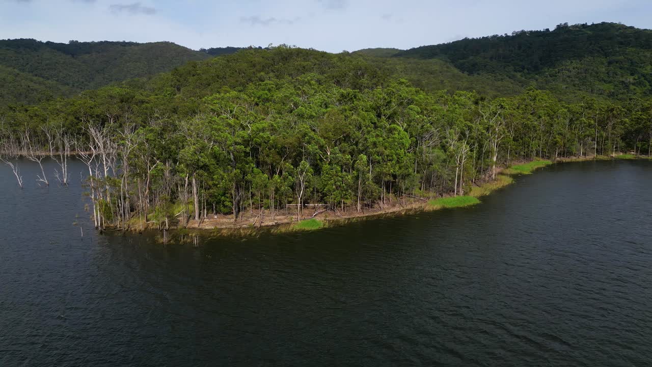 Left to right aerial views of Advancetown Lake near the Western Boat Ramp on the Gold Coast Hinterland.