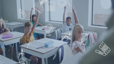 animation of school icons over happy diverse schoolchildren at desks raising hands in classroom