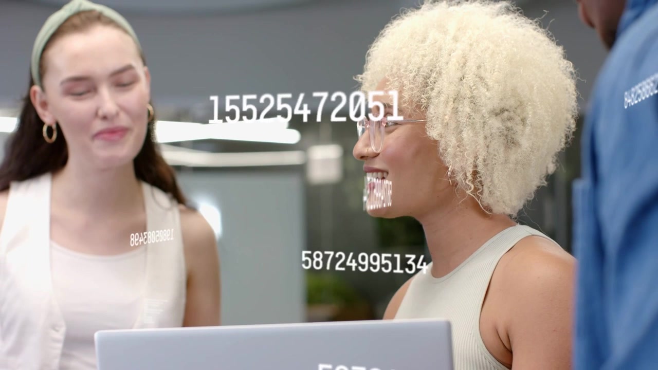 Man speaking prompts woman at laptop turning, speaking, overlays, coffee offered, smiles, business